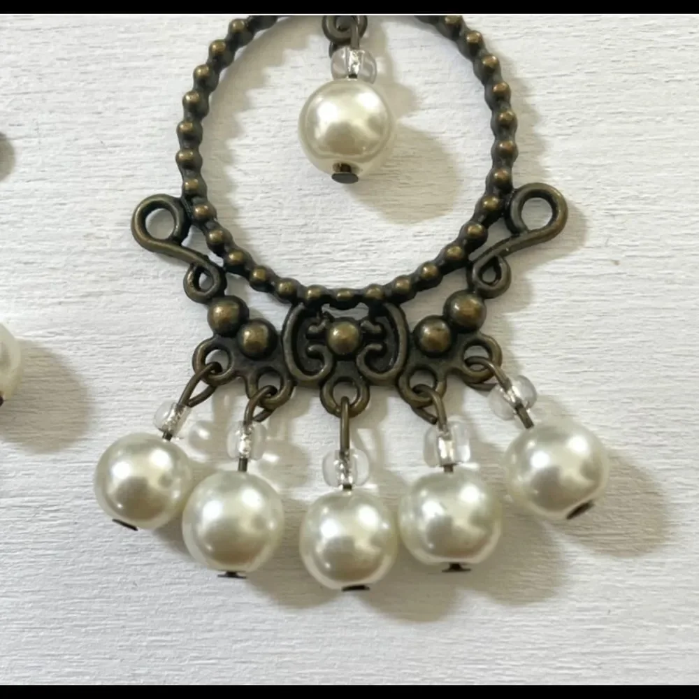 Pearl beaded dangling earrings